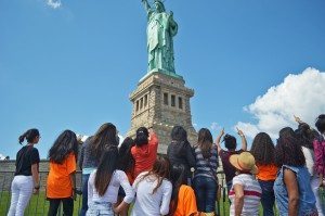 A group from the Latina Girls Project at the Statue of Liberty in summer 2014.